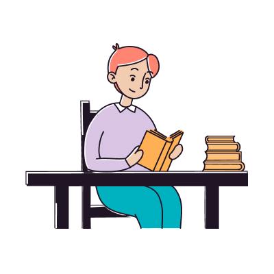 Un garçon qui lit un livre